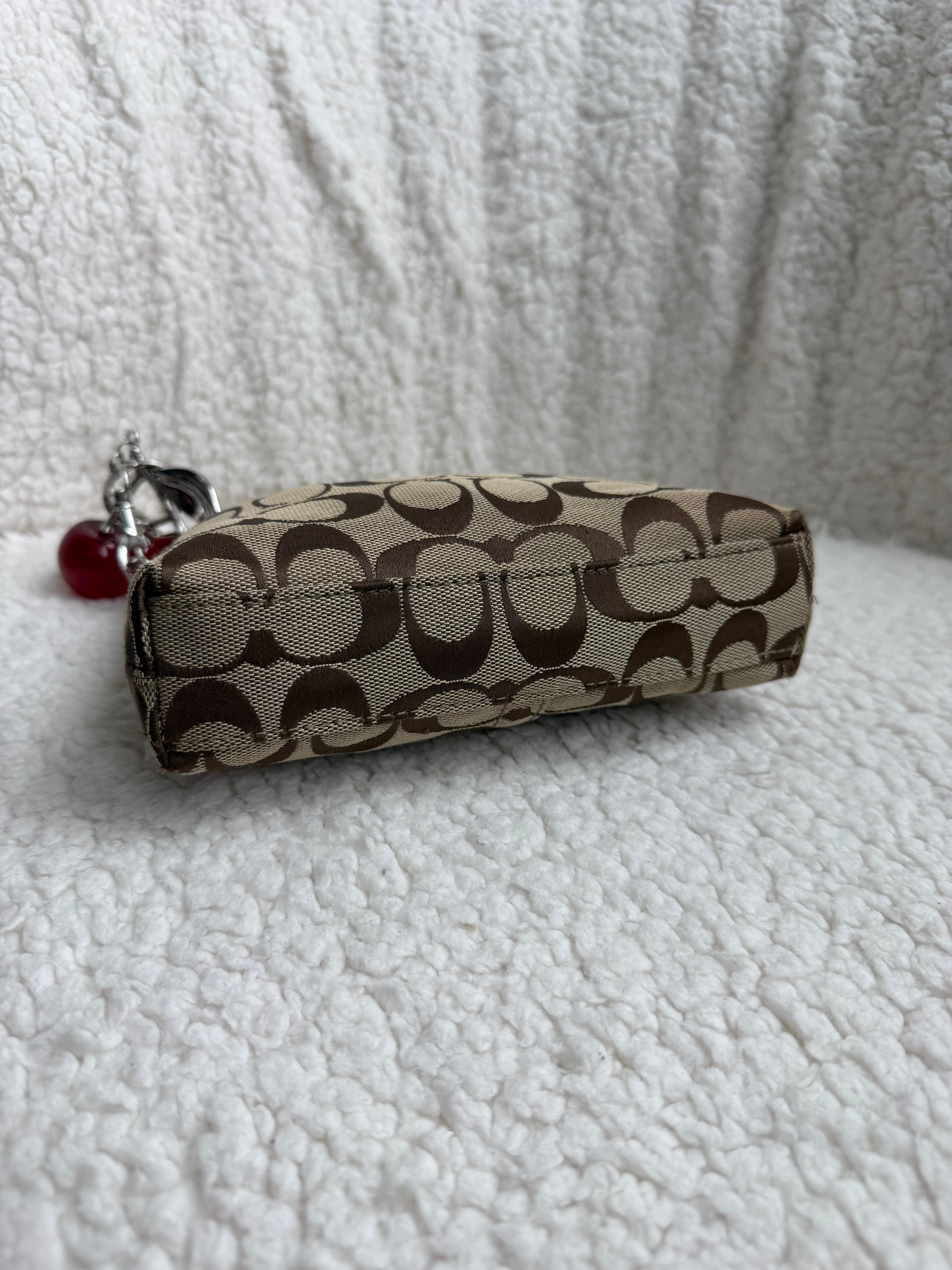 Coach Turnlock Mini Bag