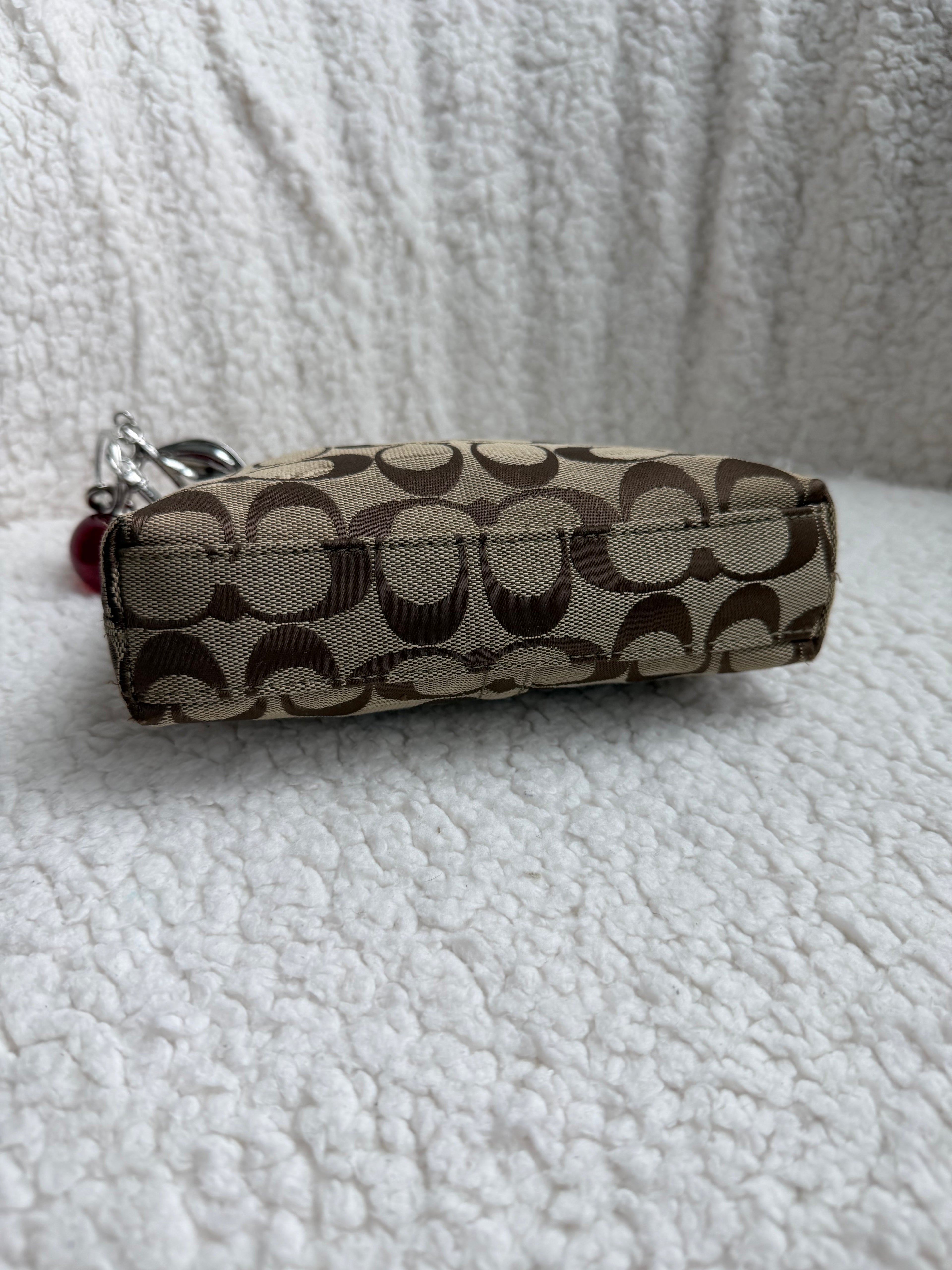 Coach Turnlock Mini Bag